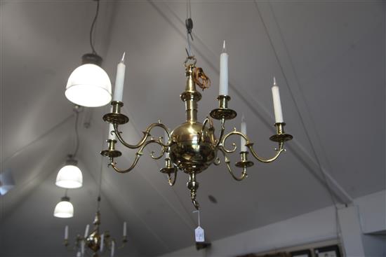 A pair of 17th century style Dutch design six branch ball and column ceiling chandeliers